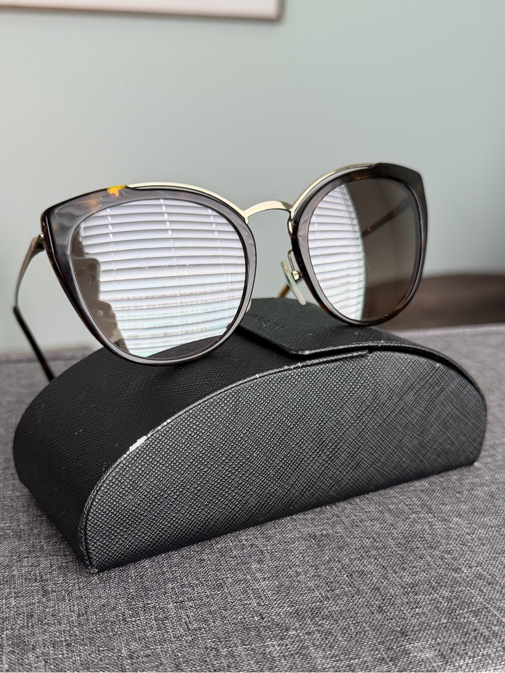 Prada Cat-Eye Sunglasses in Tortoiseshell and Gold